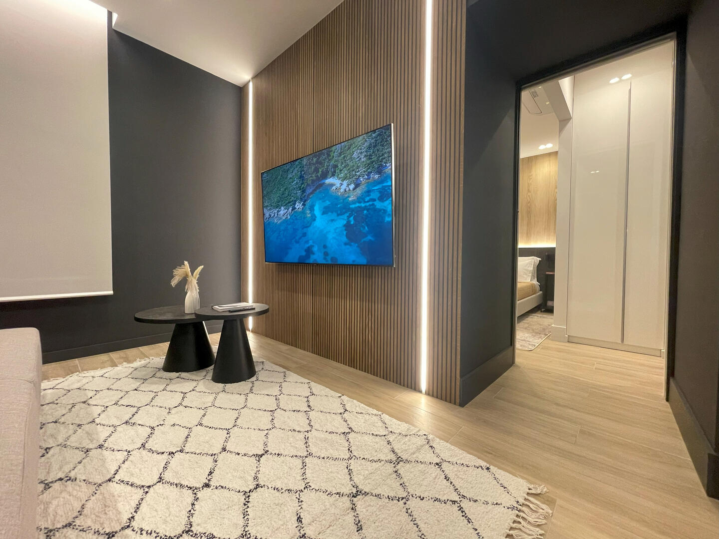 Living area leading to the Bedroom and Bathroom